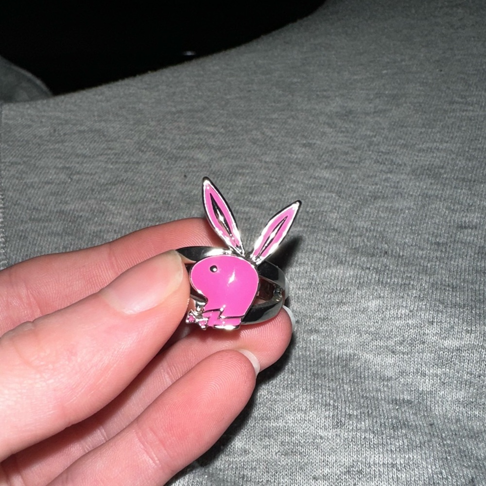 Pink playboy ring, I believe it’s a size 9 but I’m not sure.